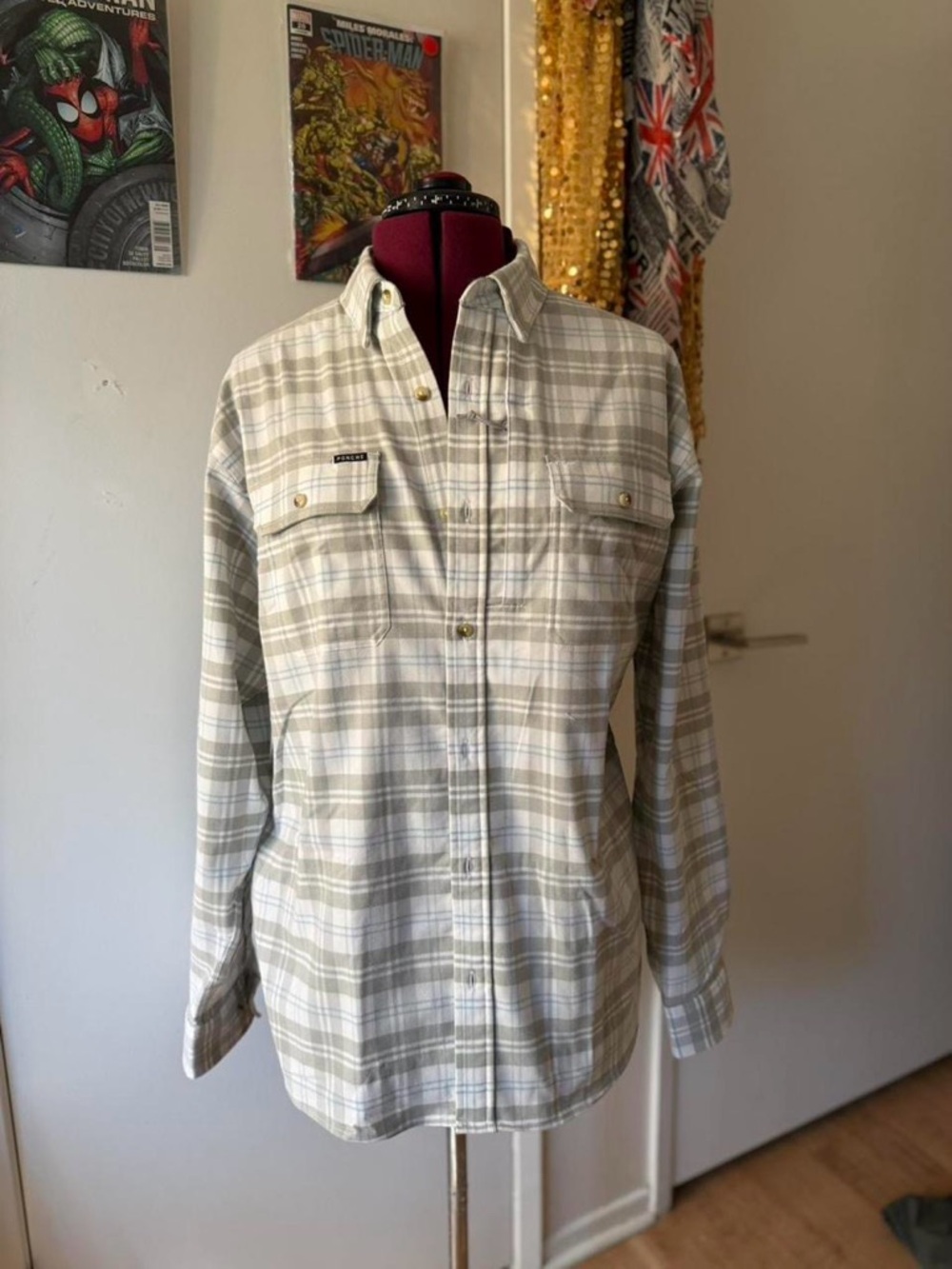 Rare Poncho Outdoors "Snowcat" flannel shirt, which features zipper pockets